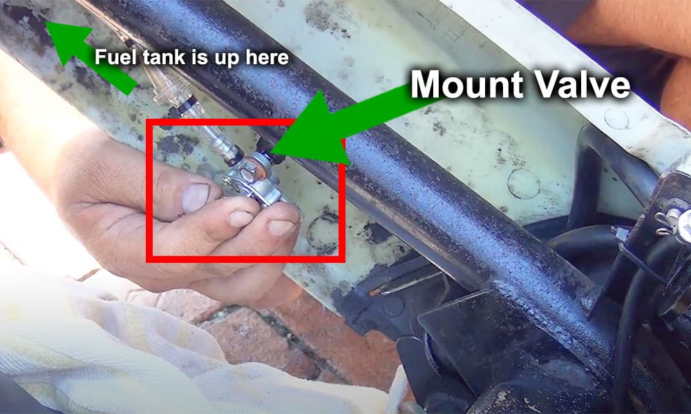 image of the fuel cut off valve being mounted to the frame of the motorcycle