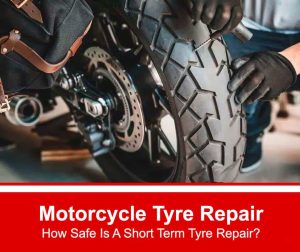 Motorcycle tyre being repaired by a man wearing rubber gloves