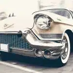 a classic cadillac captured in motion showcasing its vintage