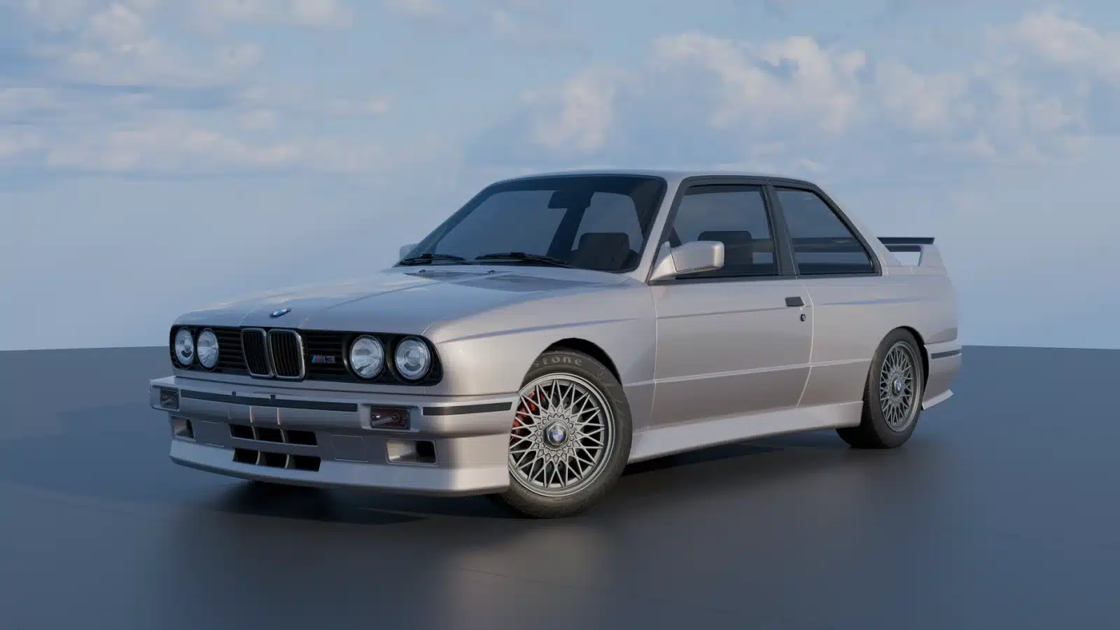Beautiful shot of a BMW M3 E30 under a blue sky, showcasing its elegance and design.